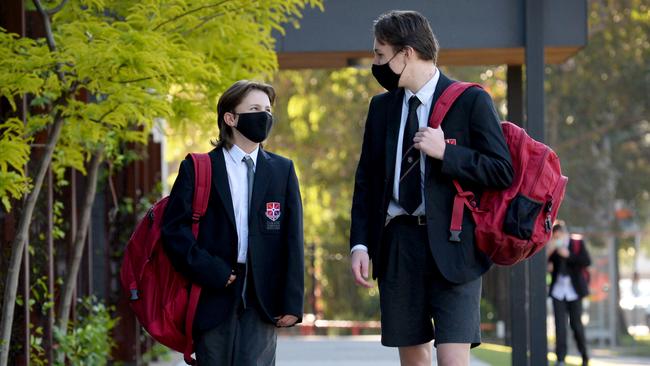 Caroline Chisholm Catholic College siblings Hamish and Samuel return to the classroom. Picture: NCA NewsWire/Andrew Henshaw