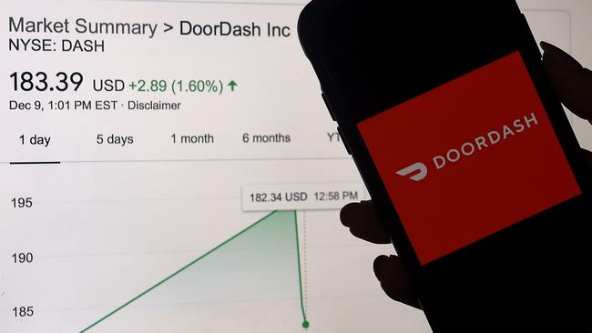 The Doordash logo is displayed on a mobile phone screen as the delivery service made its US stock market debut. Picture: AFP