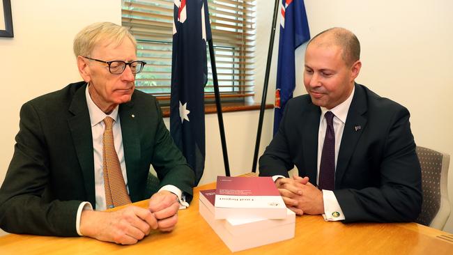 Commissioner Kenneth Hayne and Treasurer Josh Frydenberg with the final report from the Royal Commission into Misconduct in the Banking, Superannuation and Financial Services Industry. Picture: Kym Smith