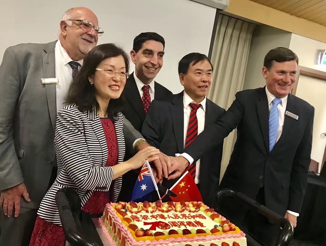 Gladys Liu cuts the cake at a Melbourne event to mark the 70th anniversary of Chinese Communist Party rule.