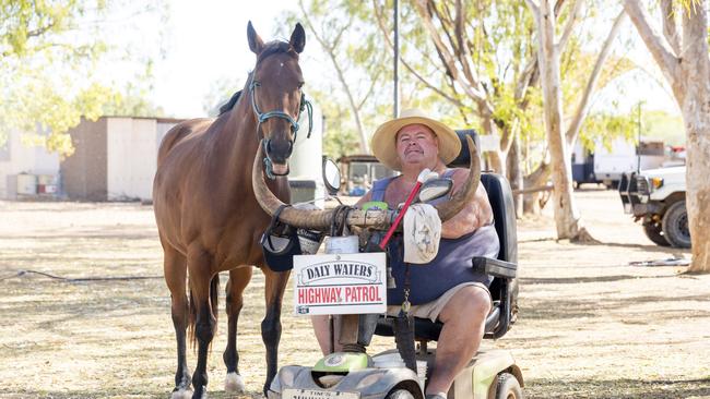 Tim Carter is the publican behind both the Daly Waters Pub and Adelaide River Inn, pictured with his horse Polly. Picture: Floss Adams.