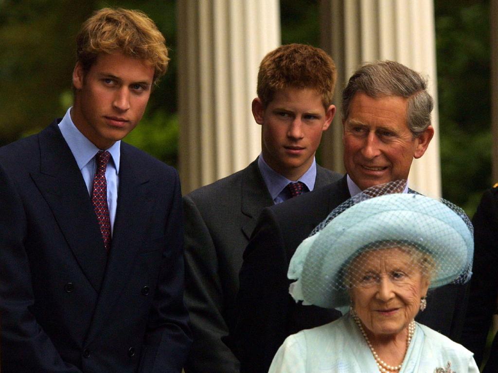 Prince Harry with Prince William, the then Prince Charles, and the Queen Mother in August 2001. Picture: Getty Images