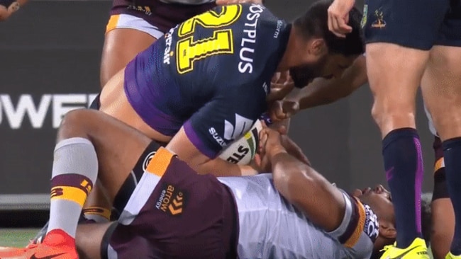 Sam Thaiday pulling on Jesse Bromwich's injured thumb.