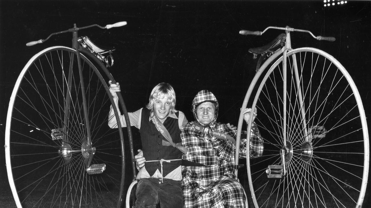 Royal Adelaide Show. Penny Farthing Cycle Club of SA's race around the trotting track at Wayville Showgrounds 05 Sep 1981. From left winner Des McCallum, 15, of Rudall and fashion priz ewinner Clair Stuart Prosser of Melrose.