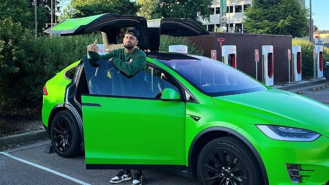 Nick Kyrgios with his Tesla. Picture: Instagram