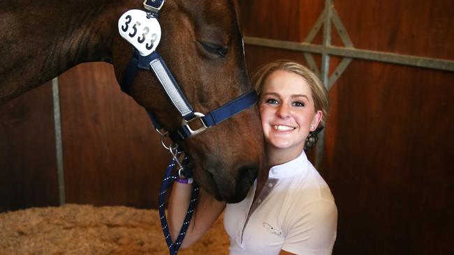 Emma Booth, with her horse Zidane, during her time qualifying for the Paralympics three years after becoming a paraplegic. Picture: Dylan Robinson