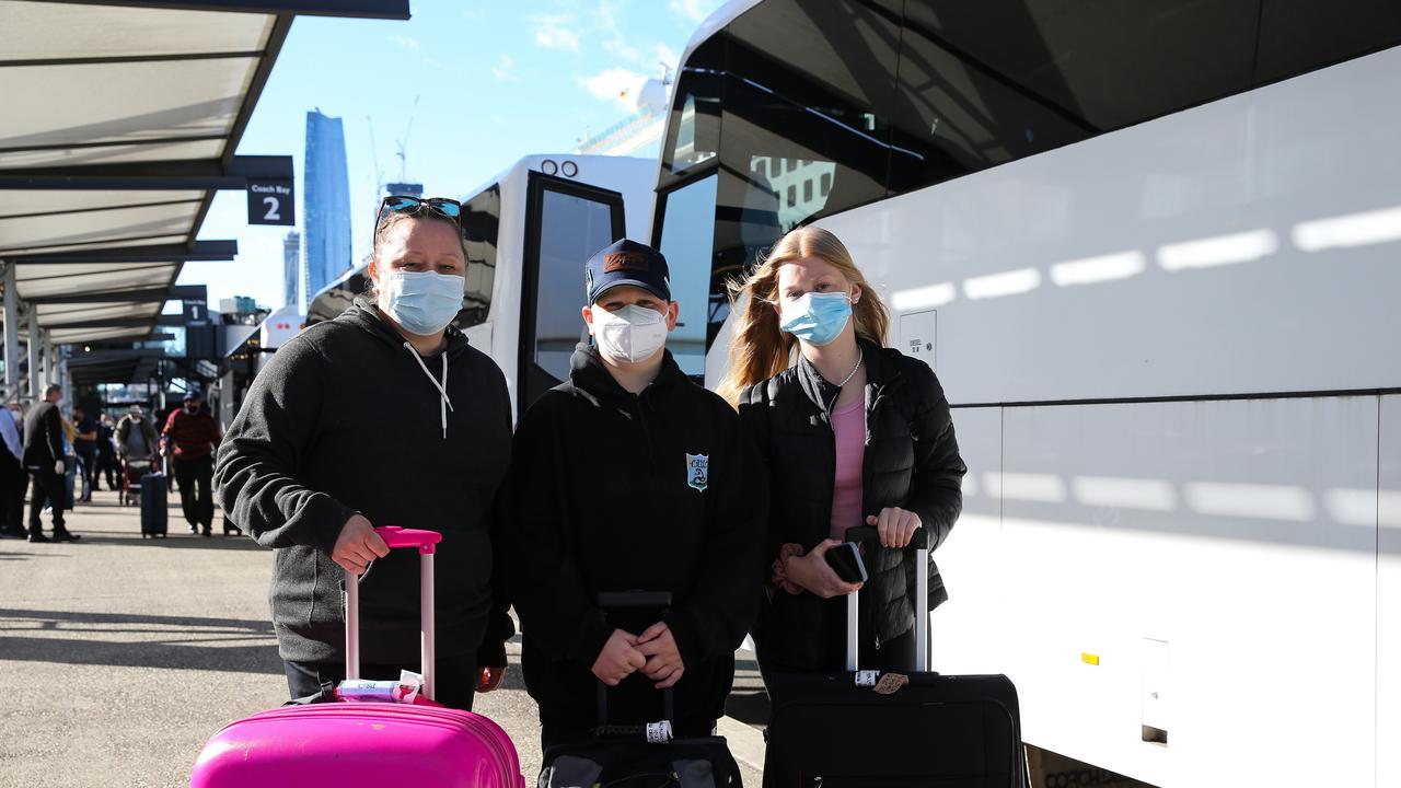 Sasha Pauline and her two kids James and Rachel McKenzie disembarked from the P&amp;O Pacific Explorer cruise ship after it arrived in Sydney. Picture: NCA NewsWire / Gaye Gerard