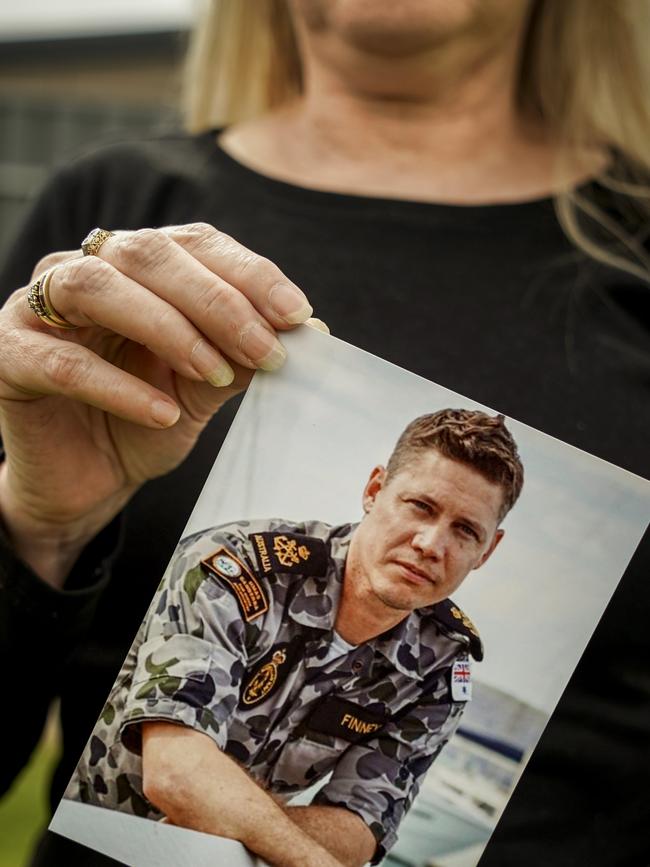 Julie-Ann Finney holds a photo of her late son David. Picture: Mike Burton