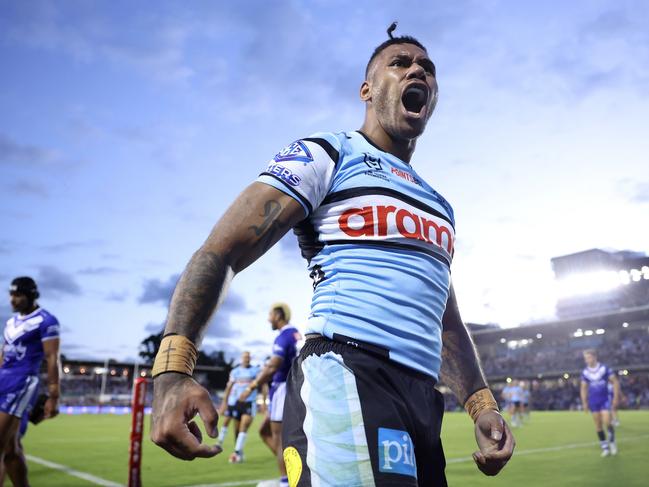 SYDNEY, AUSTRALIA - MARCH 15: Sione Katoa of the Sharks celebrates after scoring a try during the round two NRL match between Cronulla Sharks and Canterbury Bulldogs at PointsBet Stadium on March 15, 2024, in Sydney, Australia. (Photo by Mark Metcalfe/Getty Images)