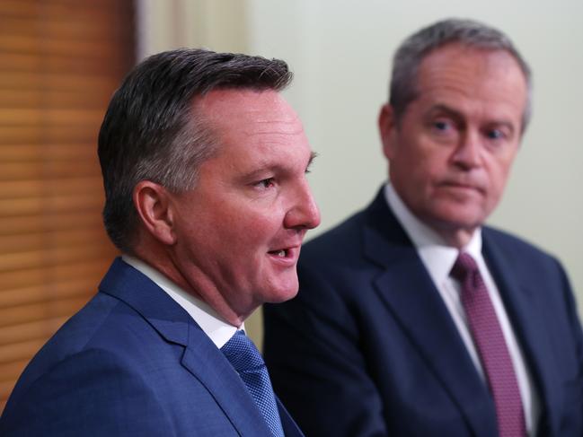 Labor leader Bill Shorten (R) and Shadow Treasurer Chris Bowen (L) hold a press conference in Melbourne, Friday, October 12, 2018. Labor are revealing today the ALP will back the Government's plan to fast-track tax cuts to small businesses. (AAP Image/David Crosling) NO ARCHIVING,