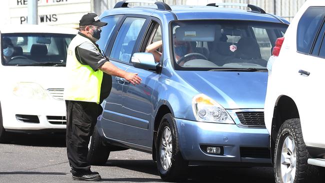 Cars line up at the Queensland Health Covid-19 testing centre at Portsmith on Aumuller Street after Cairns Covid case last week. Picture: Brendan Radke