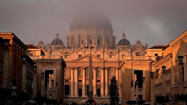 Light fog blankets St Peter's Basilica, in The Vatican on Sunday. Picture: AFP