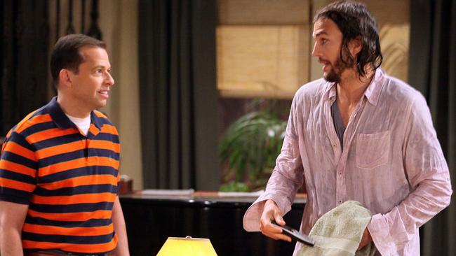 The ex factor ... Jon Cryer and Ashton Kutcher on the set of Two and a Half Men. Picture: Supplied