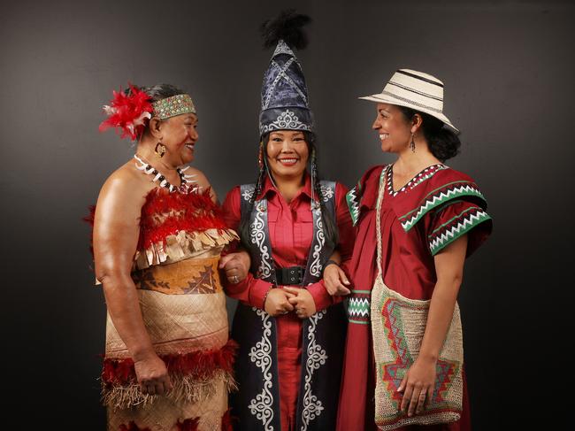 Cholpon Tabyldieva (centre), with fellow 177 Nations of Tasmania exhibition participants Loni Kube and Ana Carolina Ceballos. Picture: Nikki Davis-Jones