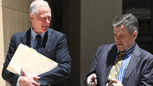 Gold Coast lawyer Beau Hartnett, with his barrister Richard Cowen, leaves the Federal Court where he attending a hearing into his personal insolvency. Picture: NewsWire / John Gass