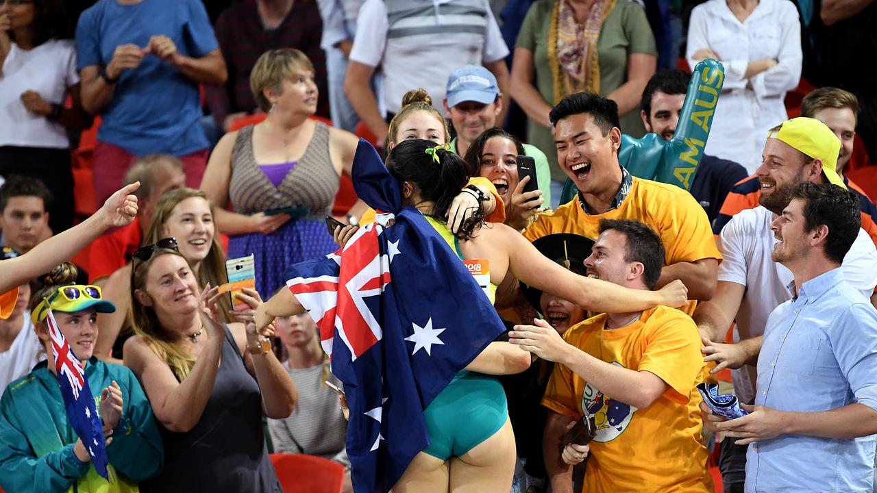 95: Michelle Jenneke of Australia greets spectators after being just missing out on a medal by finishing fourth in the Women's 100m Hurdles Final. Picture: AAP