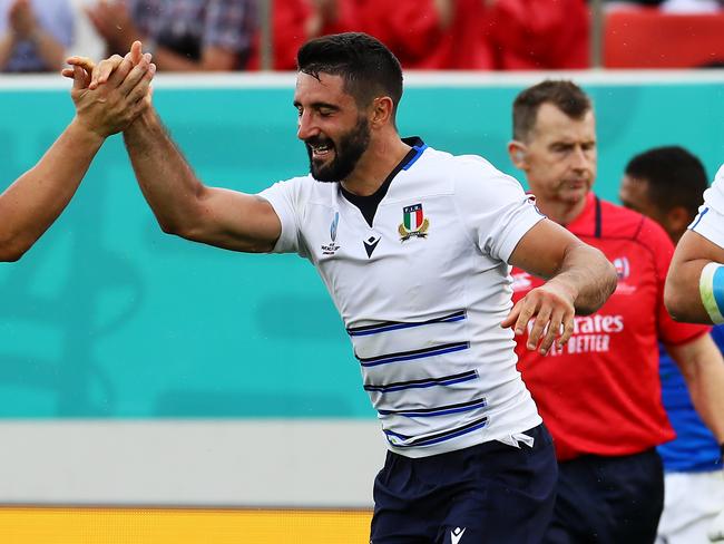 HIGASHIOSAKA, JAPAN - SEPTEMBER 22: Tito Tebaldi of Italy celebrates scoring his side's second try with his team mate Luca Morisi during the Rugby World Cup 2019 Group B game between Italy and Namibia at Hanazono Rugby Stadium on September 22, 2019 in Higashiosaka, Osaka, Japan. (Photo by Ken Ishii/Getty Images)