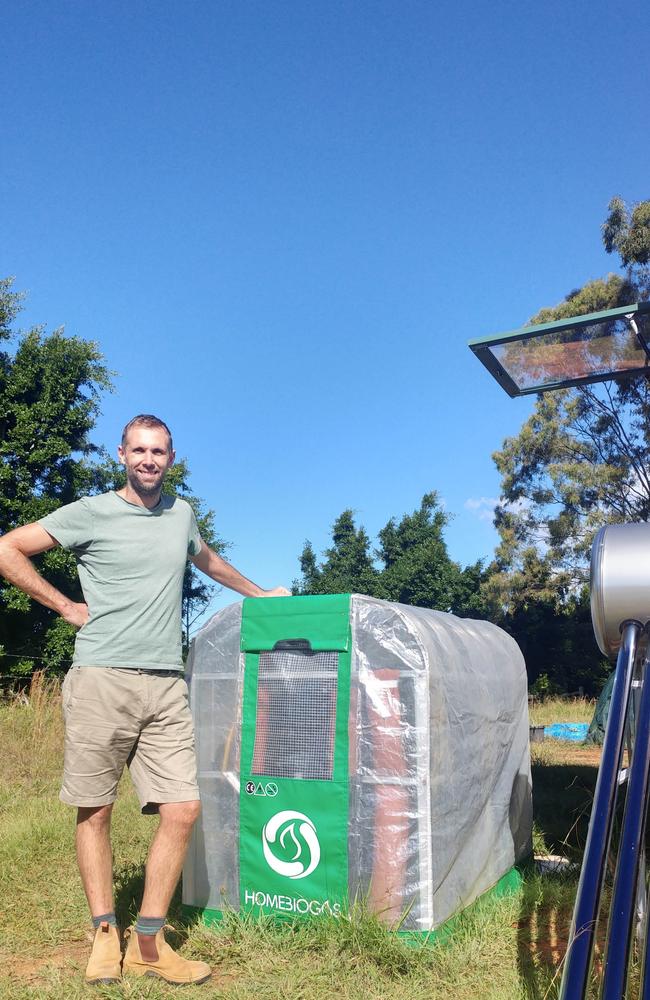 Paul posing with his biodigester. Picture: Media Drum World/Australscope 