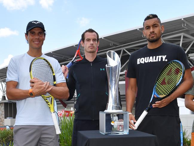 (left to right) Jo-Wilfried Tsonga of France, Rafael Nadal of Spain, Andy Murray of Great Britain, Nick Kyrgios of Australia and Kei Nishikori of Japan pose for a photograph with the Brisbane International trophy on day one of the Brisbane International tennis tournament at the Queensland Tennis Centre in Brisbane, Monday, December 31, 2018. (AAP Image/Darren England) NO ARCHIVING, EDITORIAL USE ONLY