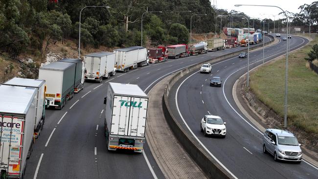 Major delays on the South Eastern Freeway near Crafers after an early morning truck accident in March. Picture: AAP Image/Kelly Barnes