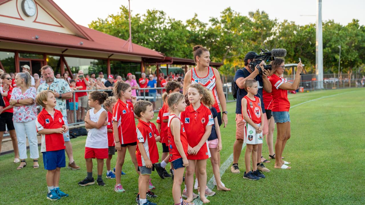 The Waratahs pay tribute to late, great ruckman Alexander ‘Rooch’ Aurrichio at the first game under lights at Gardens Oval. Picture: Aaron Black/AFLNT Media