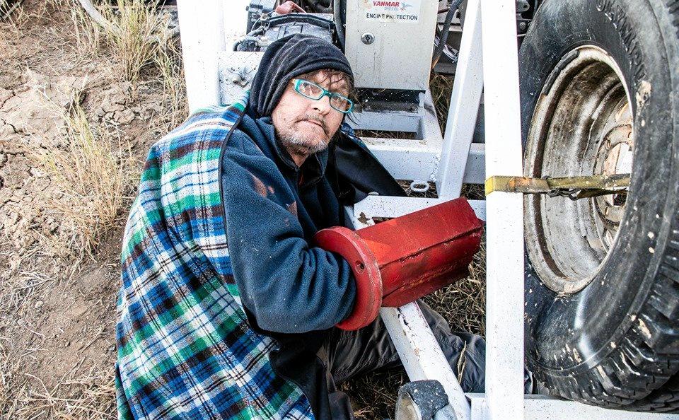 A protester locked to a drill rig at Adani's Carmichael mine site. Picture: Frontline Action on Coal