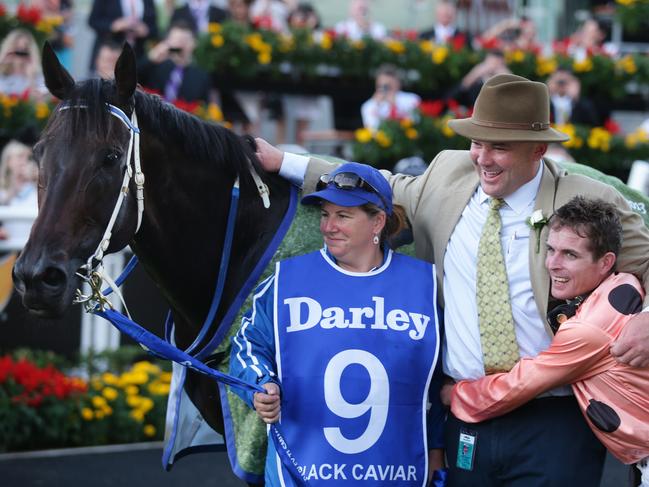 Strapper Donna Fisher, jockey Luke Nolen and Moody celebrate after another Black Caviar triumph.