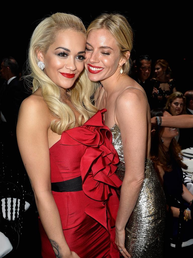 Rita Ora and Sienna Miller during amfAR’s 2015 Cinema Against AIDS Gala. Picture: WireImage