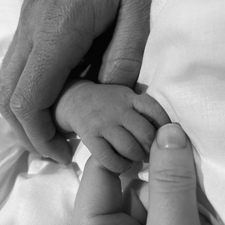 Princess Eugenie posted a photo of her and husband Jack Brooksbank holding their new baby's hand. Picture: Instagram