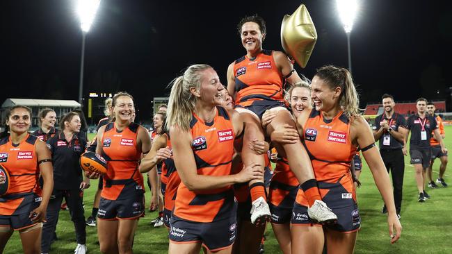 Courtney Gum is chaired from the field after playing what was thought to be her last AFLW match when Greater Western Sydney took on Geelong. Picture: Matt King/Getty Images