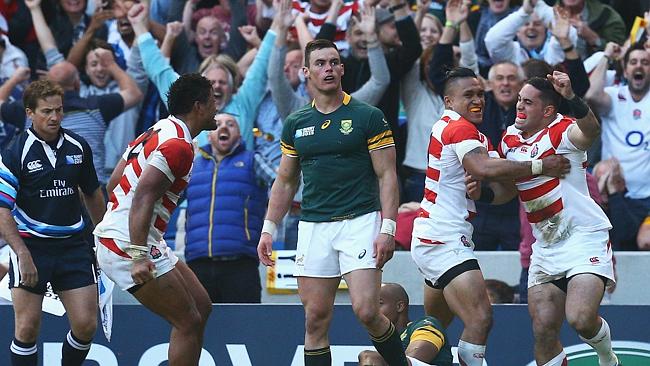 Karne Hesketh of Japan celebrates scoring the winning try during the 2015 Rugby World Cup Pool B match between South Africa and Japan.