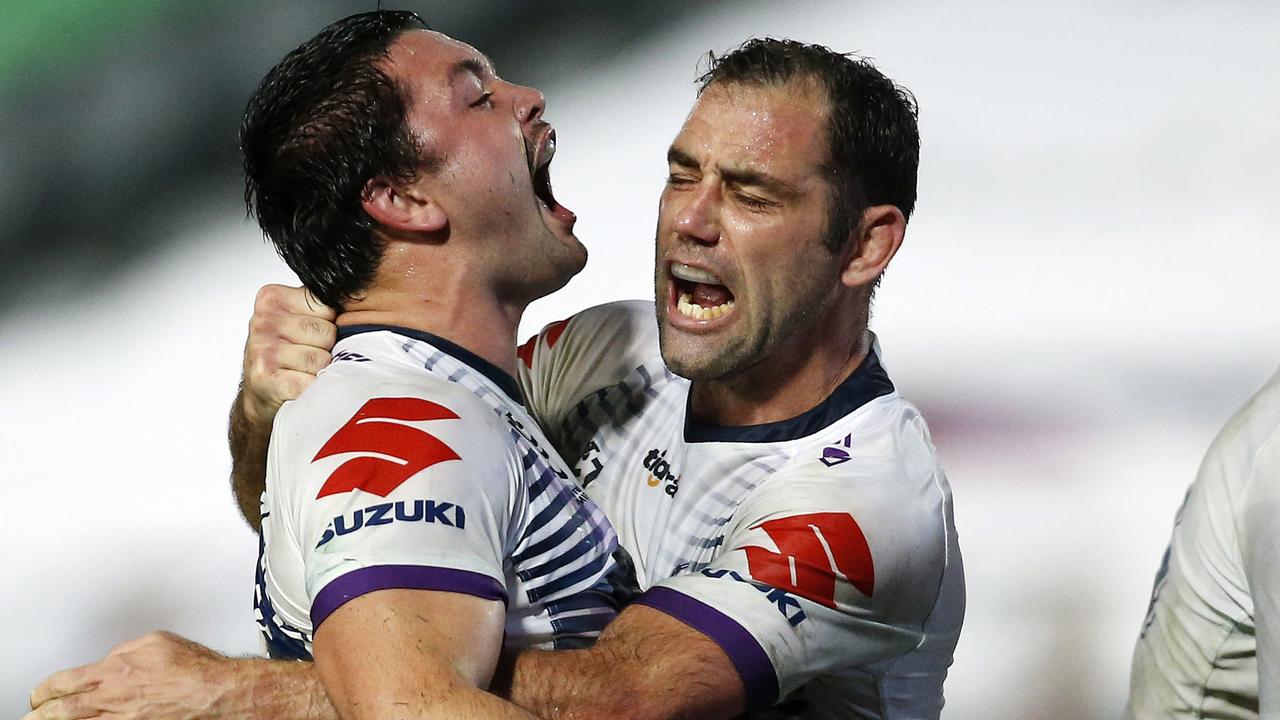 Brandon Smith and Cameron Smith of the Storm celebrate a try.