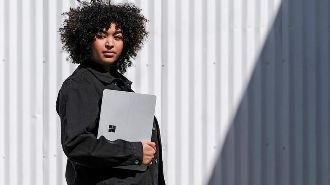 Microsoft’s Surface Laptop Studio features a 14.4-inch touchscreen that can swing forward to create a new way to work.