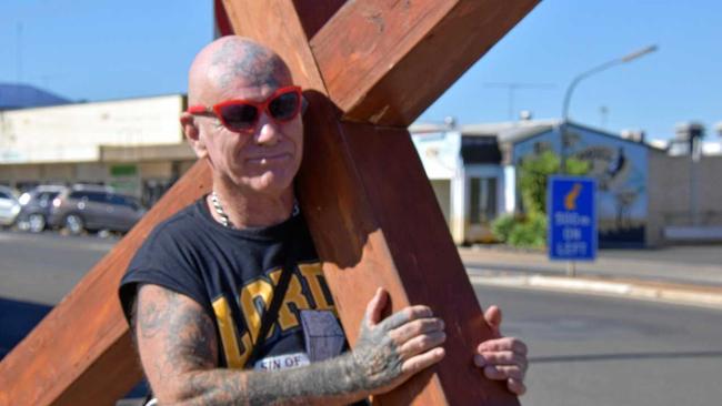 'I've always been out of the box': Kevin 'Mad Dog' Mudford is walking throughout the South Burnett with his crucifix. Picture: Matt Collins