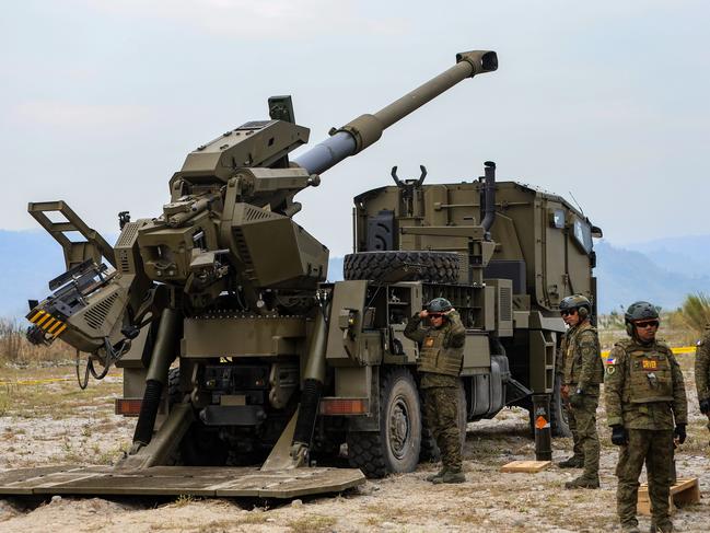 Filipino  soldiers prepare for shelling as a self-propelled artillery vehicle is deployed during a combined field artillery live fire exercise as part of the US-The Philippines Balikatan military exercises, amid growing threats from China, near New Clark City, The Philippines, 14 April 2023. The annual joint military drill by the American and Filipino forces comes days after China PLA's military exercises encircling Taiwan in early April which have brought tensions to the Taiwan-Strait and the Indo-Pacific Region. (Photo by Ceng Shou Yi/NurPhoto via Getty Images)