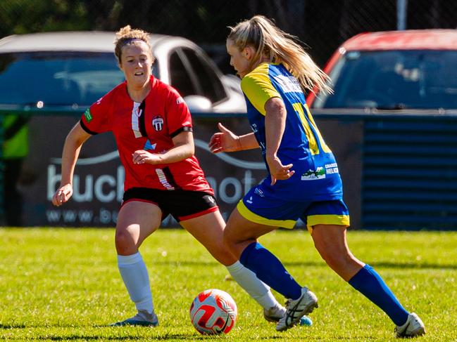 Clarence's Georgia Burt and Devonport goal-scorer Lucy Foote during the WSL grand final. Picture: Solstice Digital