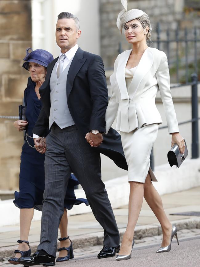 The pair looked as amazing as ever as they arrived in style. Picture: AP