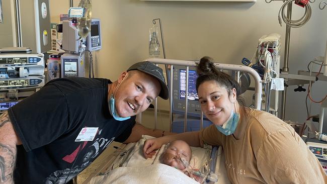 Willow Bell in hospital with her parents. Picture: Supplied