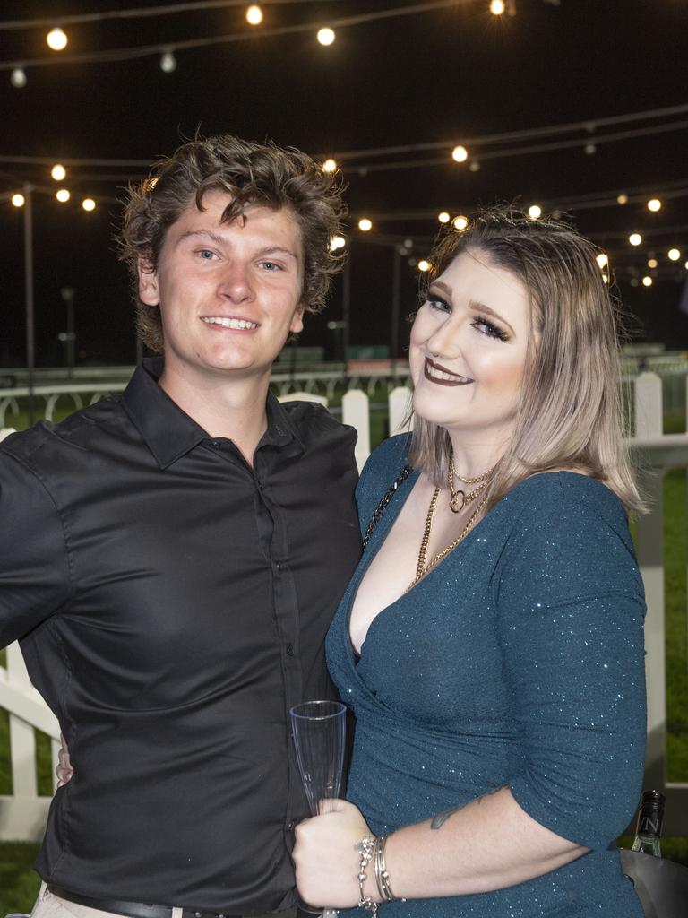 Josh Hey and Rachael Hanrahan. New Year's eve at King of the Mountain race day, Clifford Park race course. Saturday, December 31, 2022. Picture: Nev Madsen.