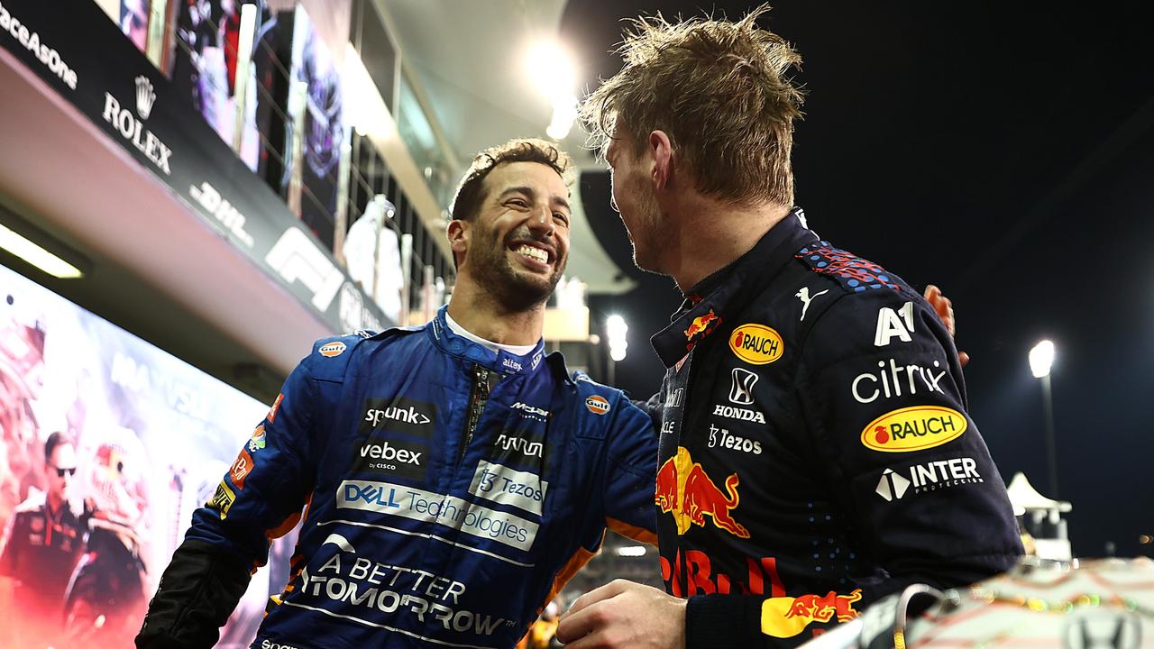 Daniel Ricciardo congratulates Max Verstappen after the latter won his maiden world championship. Picture: Mark Thompson/Getty Images