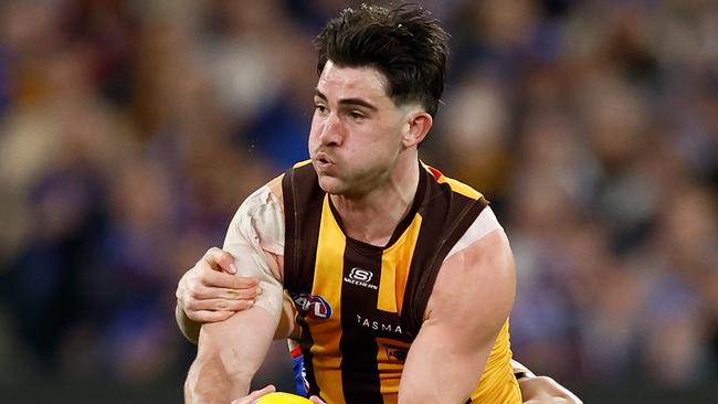 MELBOURNE, AUSTRALIA - SEPTEMBER 06: Jai Newcombe of the Hawks is tackled by Harvey Gallagher of the Bulldogs during the 2024 AFL Second Elimination Final match between the Western Bulldogs and the Hawthorn Hawks at The Melbourne Cricket Ground on September 06, 2024 in Melbourne, Australia. (Photo by Michael Willson/AFL Photos via Getty Images)