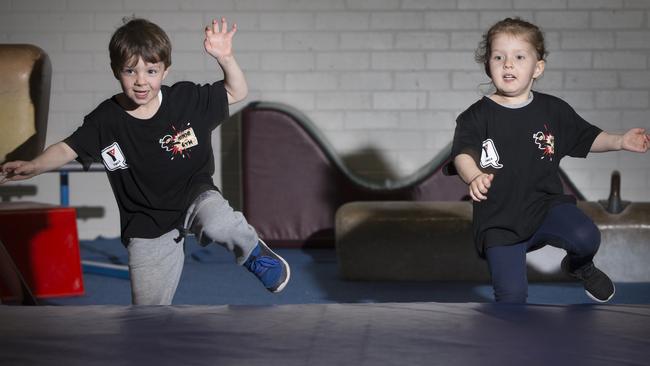 Three-year-old Ben Devlin and Indie Grgic, 3, pose for action photographs at Bankstown YMCA, Picture: AAP/Melvyn Knipe