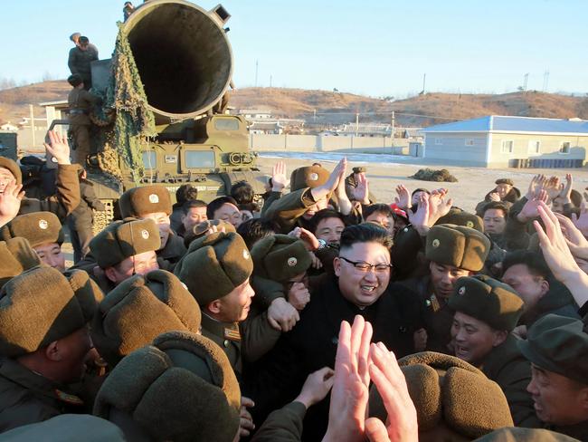 North Korean leader Kim Jong-Un surrounded by soldiers of the Korean People's Army after the test-launch of a surface-to-surface medium long-range ballistic missile Pukguksong-2. Picture: KCNA