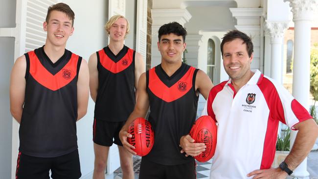 New Rostrevor College football director and first XVIII coach James Allan with players (from left) Matthew Dnistriansky, Ned Carey and Xavier Tranfa. Picture: Rostrevor College