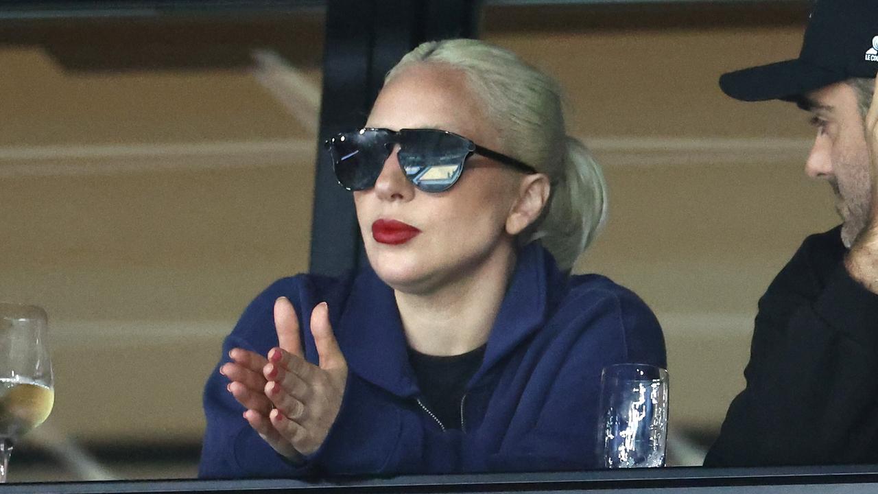 Lady Gaga enjoys the gymnastics. Picture: Getty Images