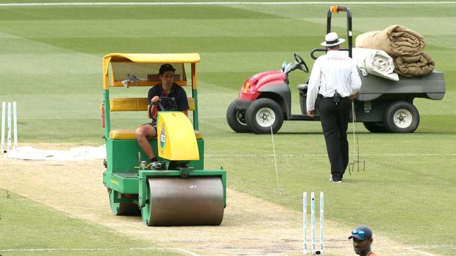 Ground staff prepare the pitch ahead of play on day three of the Boxing Day Test. Pic: AAP