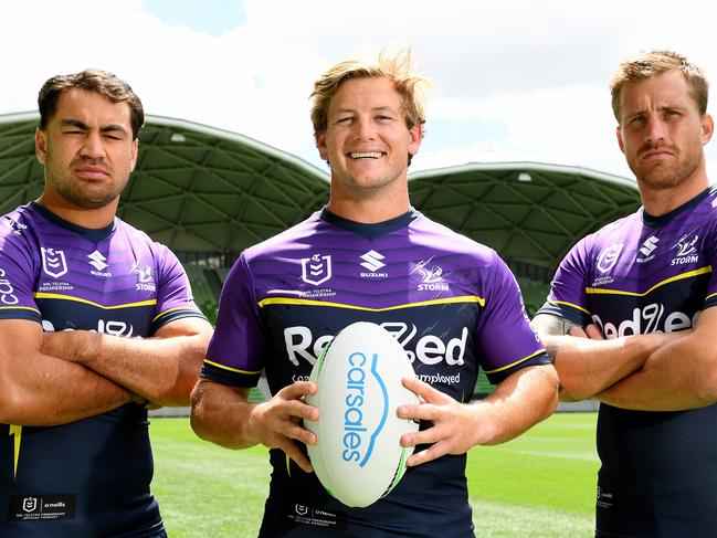 MELBOURNE, AUSTRALIA - FEBRUARY 07: Vice-captain Jahrome Hughes, captain Harry Grant and vice-captain Cameron Munster of the Storm pose during a Melbourne Storm NRL captaincy announcement at AAMI Park on February 07, 2024 in Melbourne, Australia. (Photo by Josh Chadwick/Getty Images)