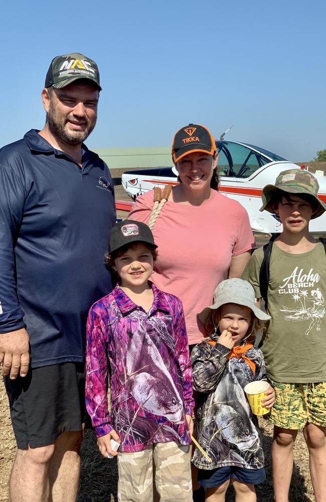 Enjoying the day out are (from left) Shaune Wells, Mackenzie Wells-Minnett, 7, Shannon Minnett, Ashton Wells-Minnett, 3, and Cooper Wells-Minnett at the Pitch Black Open Day at RAAF Darwin. Saturday, August 27, 2022. Picture: Tara Miko