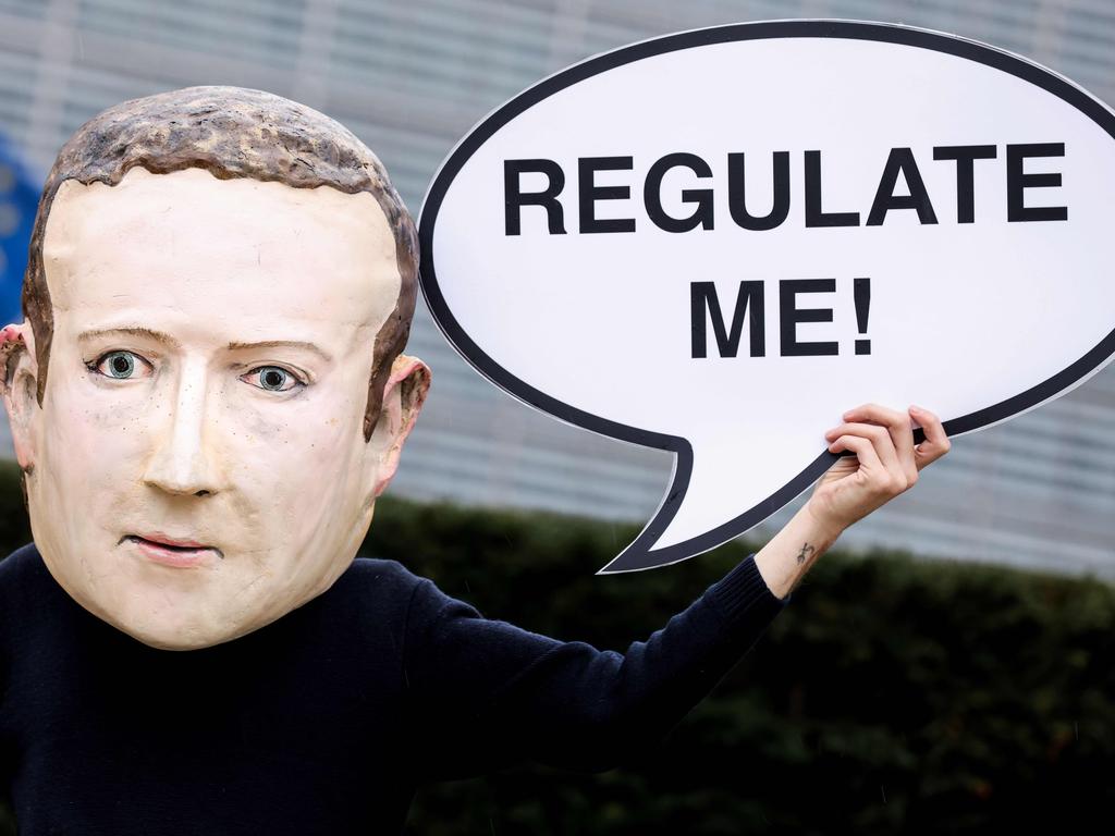 An activist in Belgium dresses as Mark Zuckerberg asks to be regulated. In Australia, Facebook has reacted to attempts at regulation by banning news content. Picture: Kenzo Tribouillard / AFP