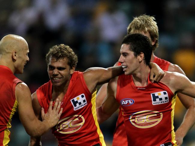 QClash 1 between Gold Coast Suns and Brisbane Lions from the Gabba - Gary Ablett, Nathan Krakouer and Michael Rischitelli